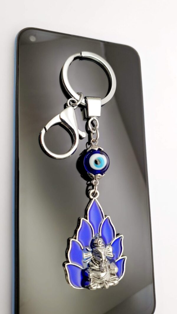 trendy evil eye charm ganesha