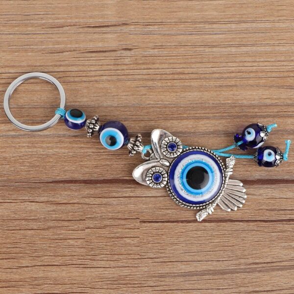 trendy evil eye owl charm